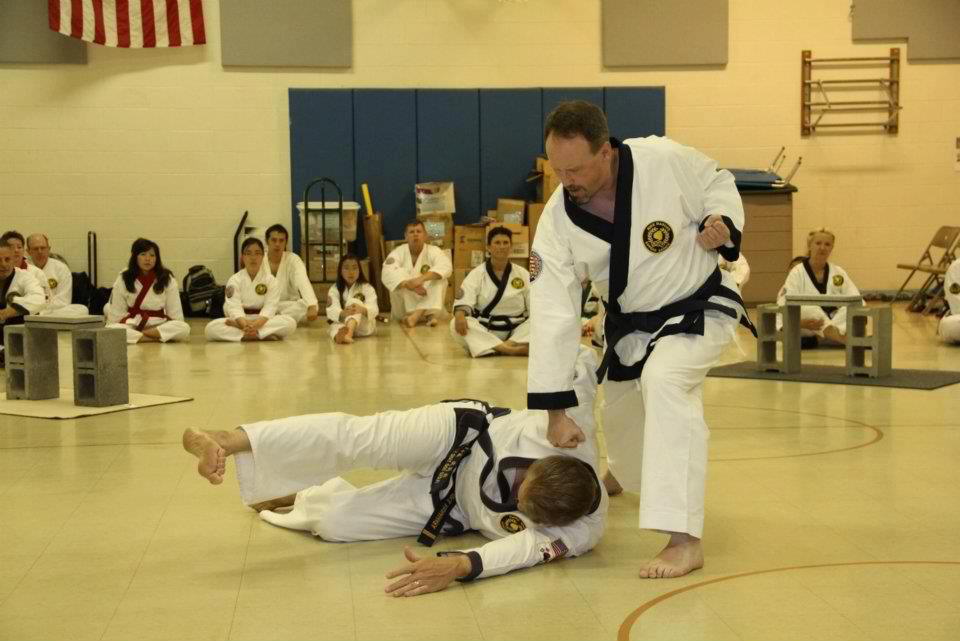 Joe taking Mike down